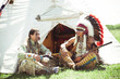Photo: North American Indian in full dress. Reconstruction North American Indian in full dress. Reconstruction
