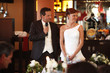 newlywed couple is talking to guests discourse