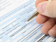 Man filling out application form Man filling out application form