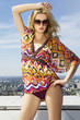 beautiful girl in sunglasses on background blue sky beautiful girl in sunglasses on background blue sky