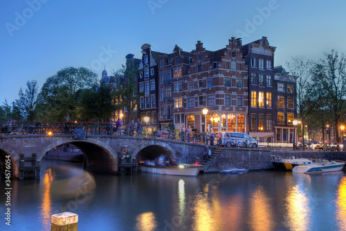 Photo: Amsterdam canal houses at twilight, The Netherlands Amsterdam canal houses at twilight, The Netherlands