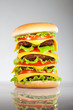 Tasty and appetizing hamburger on a grey Tasty and appetizing hamburger on a grey