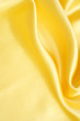 Smooth elegant golden silk can use as background Smooth elegant golden silk can use as background