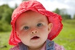 Baby girl wearing summer hat