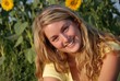 Photo: Beautiful young woman and sunflowers Beautiful young woman and sunflowers