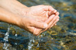 water in the hands of