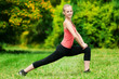 Young woman doing stretching exercise