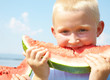 LittleBoy eating watermelon