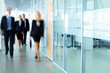 Businesspeople in corridor