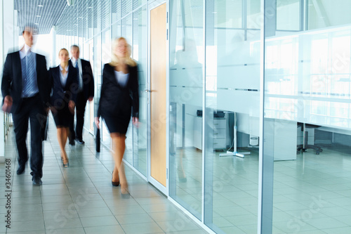 Photo: Businesspeople in corridor Businesspeople in corridor