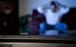 man watching tv man watching tv