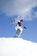 man snowboarding