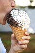Young man eating a ice cream