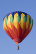 Colorful hot-air balloon against blue sky