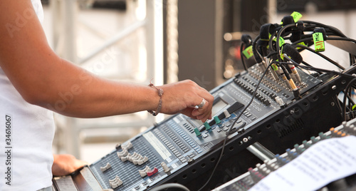 Photo: hand over music mixer hand over music mixer