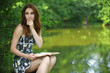 Photo: portrait of young woman holding book portrait of young woman holding book