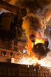 Smelting metal in metallurgical plant. Liquid iron from ladle