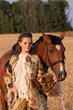 The woman in clothes of 18 centuries with horse The woman in clothes of 18 centuries with horse