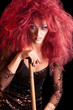 Drag Queen. Man dressed as Woman. On black.