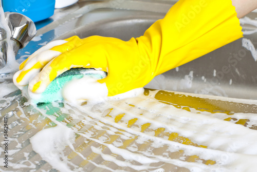 Photo: Hand with sponge Hand with sponge