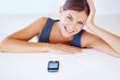 Photo: Executive smiling with cellphone Executive smiling with cellphone