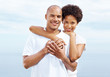 Portrait of a romantic young couple standing together