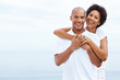 Loving young couple standing together looking happy