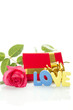 Red Rose, gift box and the text "LOVE"