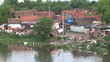 Gypsy settlement near the river, garbage dump