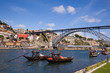 Tradicional vintage port transporting boats near famous bridge P Tradicional vintage port transporting boats near famous bridge P