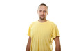 man with a beard and mustache in yellow shirt
