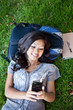 Asian college student listening to music