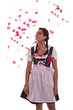 Foto: Rosenblätter regnen auf eine Frau in Tracht, Rosenblätter regnen auf eine Frau in Tracht,