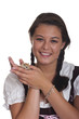 Frau in Tracht, mit Gerbil auf der Hand