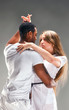 Young couple dances Caribbean Salsa, studio shot Young couple dances Caribbean Salsa, studio shot