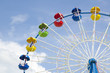 Ferris wheel detail on a blue sky