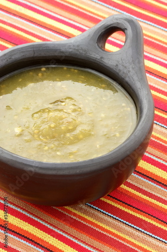 Photo: tomatillo sauce in colombian clay dish tomatillo sauce in colombian clay dish