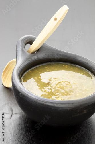 Photo: tomatillo sauce in colombian clay dish tomatillo sauce in colombian clay dish
