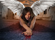 apocalyptic female angel lying in the street with bloody hands apocalyptic female angel lying in the street with bloody hands