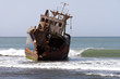 Old ship in the shallows near the shore Old ship in the shallows near the shore