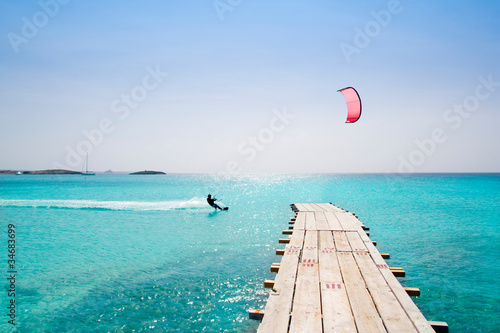 Photo: Formentera beach wood pier turquoise balearic sea Formentera beach wood pier turquoise balearic sea