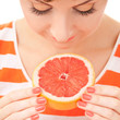 pretty woman with orange on the white background pretty woman with orange on the white background