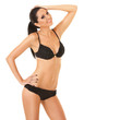 Pretty tanned woman in bikini isolated on white background