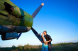 kissing under the vintage plane