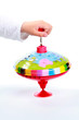 Photo: Kind spielt mit Spielzeug Kreisel Kind spielt mit Spielzeug Kreisel