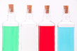 Cuatro botellas de cristal