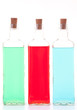 Tres botellas de cristal