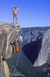 Team of climbers reaching the summit.
