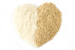 white rice and brown rice heart isolated on white