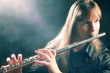 Flute playing flutist musician performer